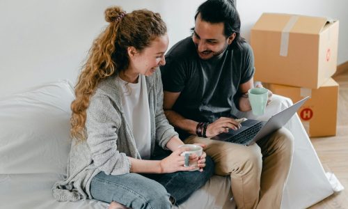 pexels-ketut-subiyanto-4245923 Couple sitting at home working through the online downloadable pre marital counselling booklet.