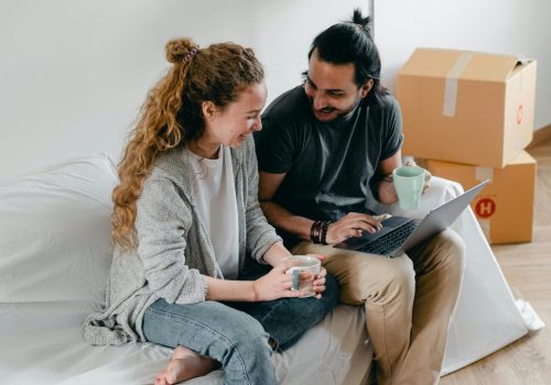 pexels-ketut-subiyanto-4245923 Couple sitting at home working through the online downloadable pre marital counselling booklet.